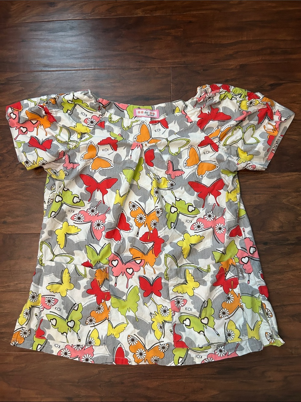 Koi Fitted Butterflies women’s Scrub Top in Multicolor